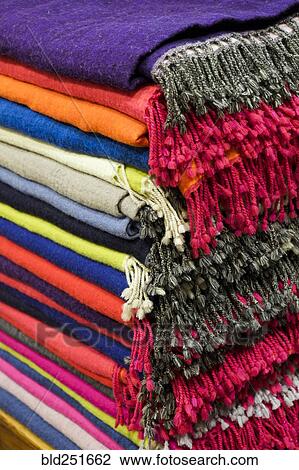 Piles of multicolor blankets with fringe View Large Photo Image Stock Image - Piles of multicolor blankets with fringe. Fotosearch