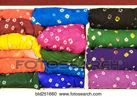 Piles of multicolor fabric View Large Photo Image Stock Image - Piles of multicolor fabric. Fotosearch