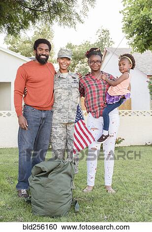 Portrait of black woman soldier with family View Large Photo Image Stock Image - Portrait of black woman soldier with family. Fotosearch