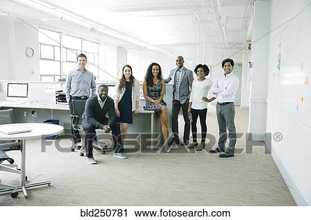 Portrait of business people in office View Large Photo Image Stock Image - Portrait of business people in office. Fotosearch