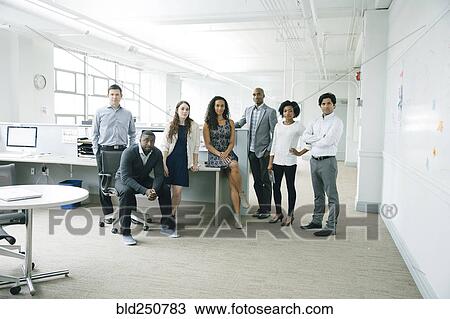 Portrait of business people in office View Large Photo Image Stock Image - Portrait of business people in office. Fotosearch