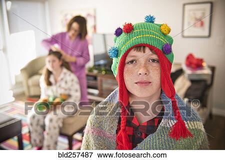 Portrait of Caucasian boy wearing Christmas tree stocking-cap View Large Photo Image Stock Photo - Portrait of Caucasian boy wearing Christmas tree stocking-cap. Fotosearch
