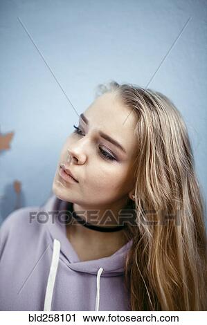 Stock Image - Portrait of Caucasian woman looking away. Fotosearch