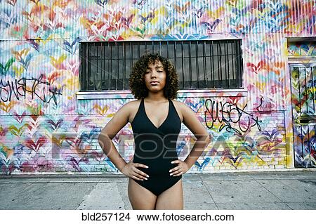 Portrait of confident mixed race ballet dancer in city View Large Photo Image Picture - Portrait of confident mixed race ballet dancer in city. Fotosearch
