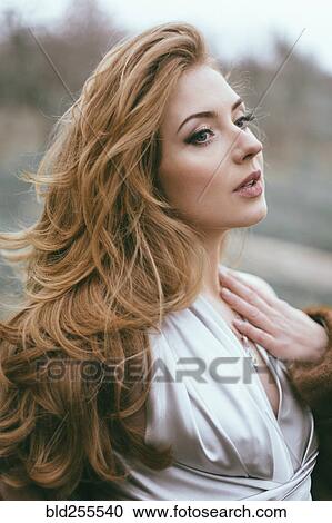Stock Image - Portrait of glamorous Caucasian woman. Fotosearch