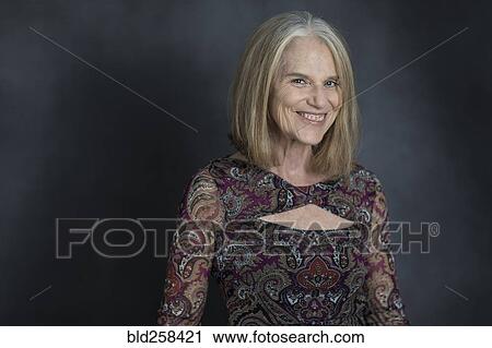 Portrait of glamorous older Caucasian woman View Large Photo Image Stock Image - Portrait of glamorous older Caucasian woman. Fotosearch