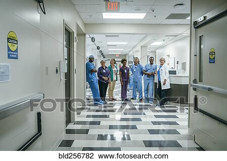Stock Image - Portrait of medical team in hospital. Fotosearch