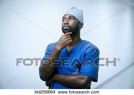 Picture - Portrait of pensive black nurse. Fotosearch