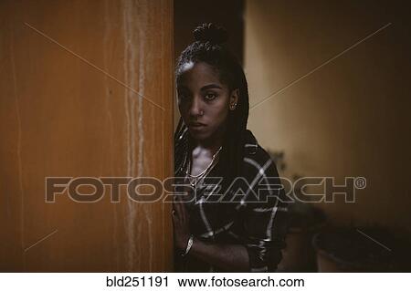 Stock Image - Portrait of serious African American woman. Fotosearch