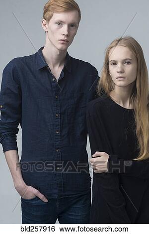 Stock Photograph - Portrait of serious Caucasian couple. Fotosearch