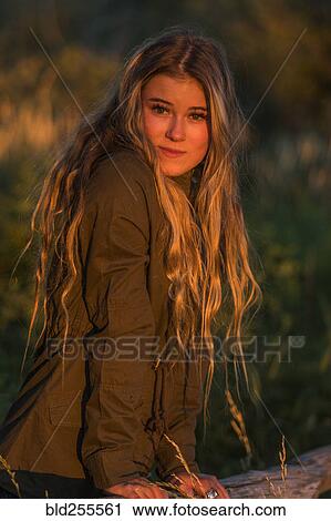 Stock Image - Portrait of serious Caucasian teenage girl. Fotosearch