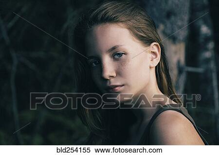Stock Photography - Portrait of serious Caucasian teenage girl. Fotosearch