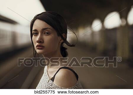 Portrait of serious Caucasian woman at train station View Large Photo Image Stock Photography - Portrait of serious Caucasian woman at train station. Fotosearch