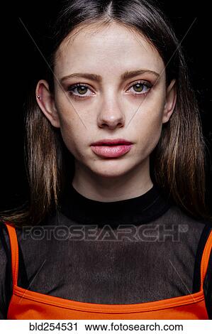 Stock Image - Portrait of serious Caucasian woman. Fotosearch