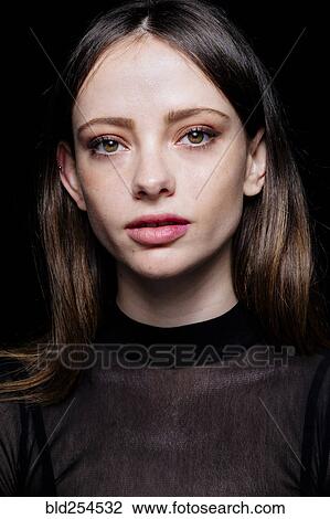 Stock Image - Portrait of serious Caucasian woman. Fotosearch