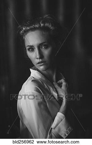 Stock Image - Portrait of serious Caucasian woman. Fotosearch