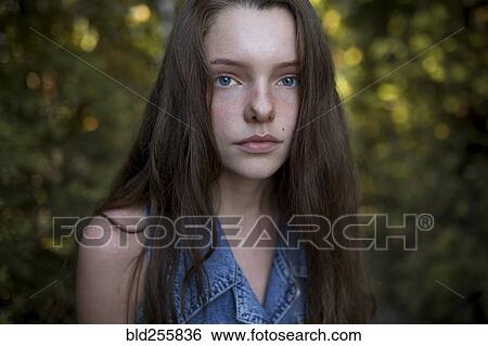 Stock Photograph - Portrait of serious Caucasian woman. Fotosearch