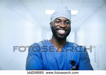 Stock Photography - Portrait of smiling black nurse. Fotosearch