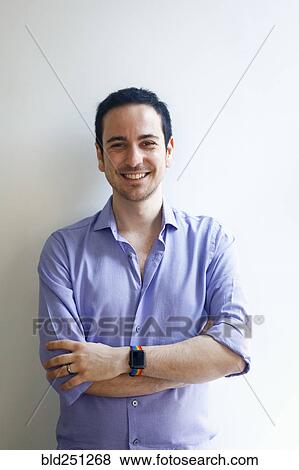 Stock Photo - Portrait of smiling Caucasian man. Fotosearch