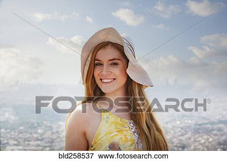 Portrait of smiling Caucasian woman wearing hat View Large Photo Image Stock Photo - Portrait of smiling Caucasian woman wearing hat. Fotosearch