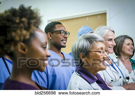 Portrait of smiling medical team View Large Photo Image Stock Photo - Portrait of smiling medical team. Fotosearch