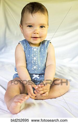 Portrait of smiling mixed race baby girl View Large Photo Image Stock Photography - Portrait of smiling mixed race baby girl. Fotosearch