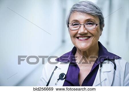 Portrait of smiling mixed race doctor View Large Photo Image Stock Photo - Portrait of smiling mixed race doctor. Fotosearch
