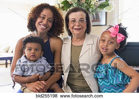 Stock Photo - Portrait of smiling mixed race multi-generation family. Fotosearch