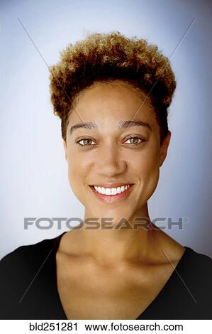 Portrait of smiling mixed race woman View Large Photo Image Stock Image - Portrait of smiling mixed race woman. Fotosearch