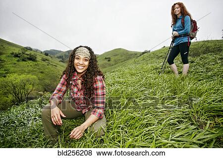 Portrait of smiling women hiking View Large Photo Image Stock Photo - Portrait of smiling women hiking. Fotosearch