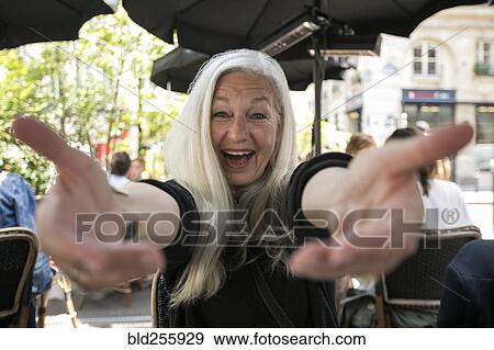 Stock Photo - Portrait of welcoming Caucasian woman. Fotosearch