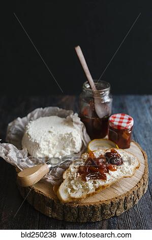 Preserves and cheese on bread View Large Photo Image Stock Photo - Preserves and cheese on bread. Fotosearch
