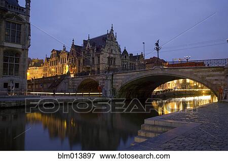 Stock Photo - Quaint buildings in town at night. Fotosearch