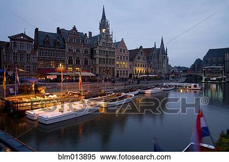 Quaint town and boats moored on canal View Large Photo Image Stock Photography - Quaint town and boats moored on canal. Fotosearch
