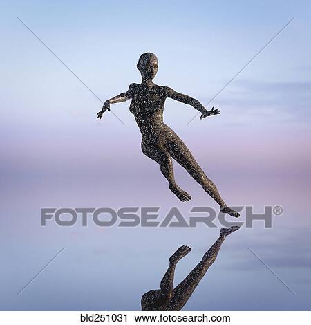 Stock Image - Reflection of futuristic woman dancing in sky. Fotosearch