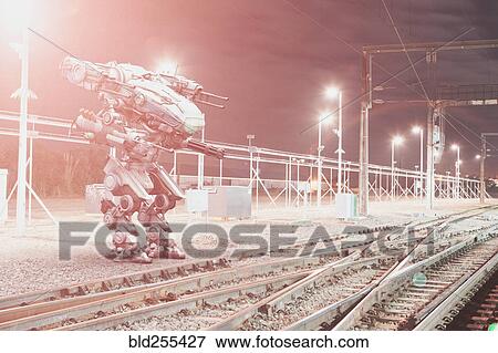 Robot aiming guns at railroad tracks View Large Photo Image Stock Photo - Robot aiming guns at railroad tracks. Fotosearch