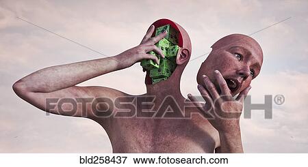 Robot man holding removable face mask and circuits View Large Photo Image Stock Photo - Robot man holding removable face mask and circuits. Fotosearch