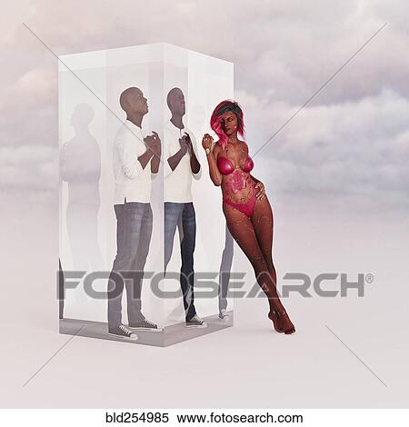 Stock Photography - Robot woman leaning on cube with a man trapped inside. Fotosearch