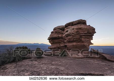 "Rocks in canyon at sunset, Moab, Utah, United States" View Large Photo Image Stock Photograph - "Rocks in canyon at sunset, Moab, Utah, United States". Fotosearch