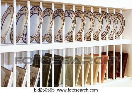 Round and square plates on display View Large Photo Image Stock Photography - Round and square plates on display. Fotosearch