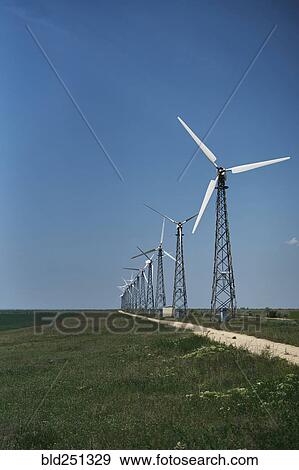 Stock Photo - Row of wind turbines. Fotosearch