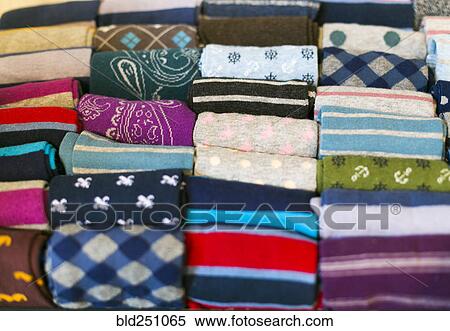 Rows of folded socks View Large Photo Image Stock Photography - Rows of folded socks. Fotosearch