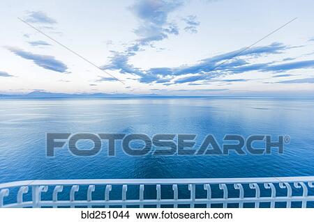 Picture - Scenic view at waterfront balcony. Fotosearch