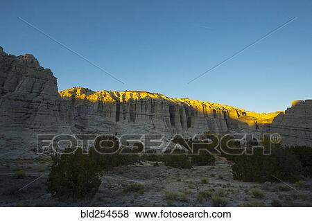 "Shadow on cliff in desert, Abiquiu, New Mexico, United States" View Large Photo Image Stock Photo - "Shadow on cliff in desert, Abiquiu, New Mexico, United States". Fotosearch