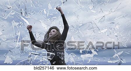 Shards of glass falling on woman View Large Photo Image Stock Photograph - Shards of glass falling on woman. Fotosearch