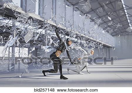 Shards of glass surrounding futuristic woman and android View Large Photo Image Stock Photo - Shards of glass surrounding futuristic woman and android. Fotosearch
