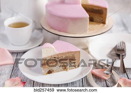 Slice of cake on plate View Large Photo Image Stock Photo - Slice of cake on plate. Fotosearch