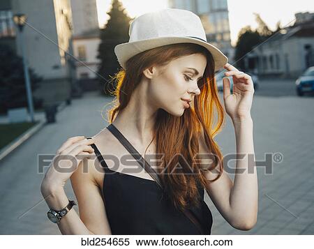 Smiling Caucasian woman in city View Large Photo Image Stock Photography - Smiling Caucasian woman in city. Fotosearch