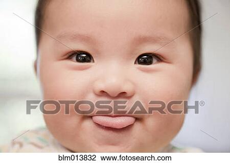 Stock Image - Smiling Chinese baby boy. Fotosearch