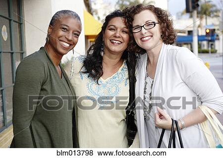 Stock Photo - Smiling friends. Fotosearch